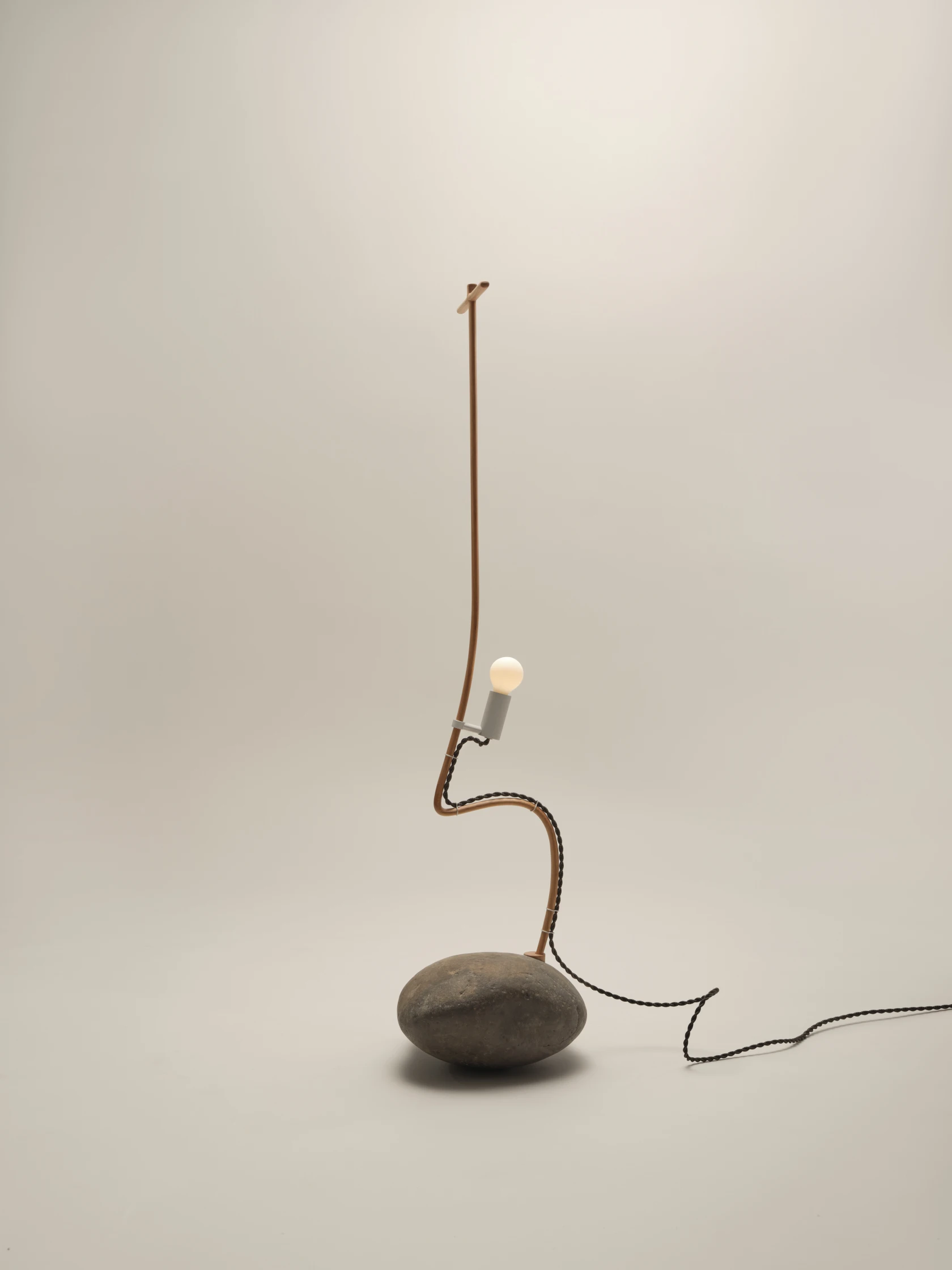 The internal construction of a lamp with a solid rock as its base.