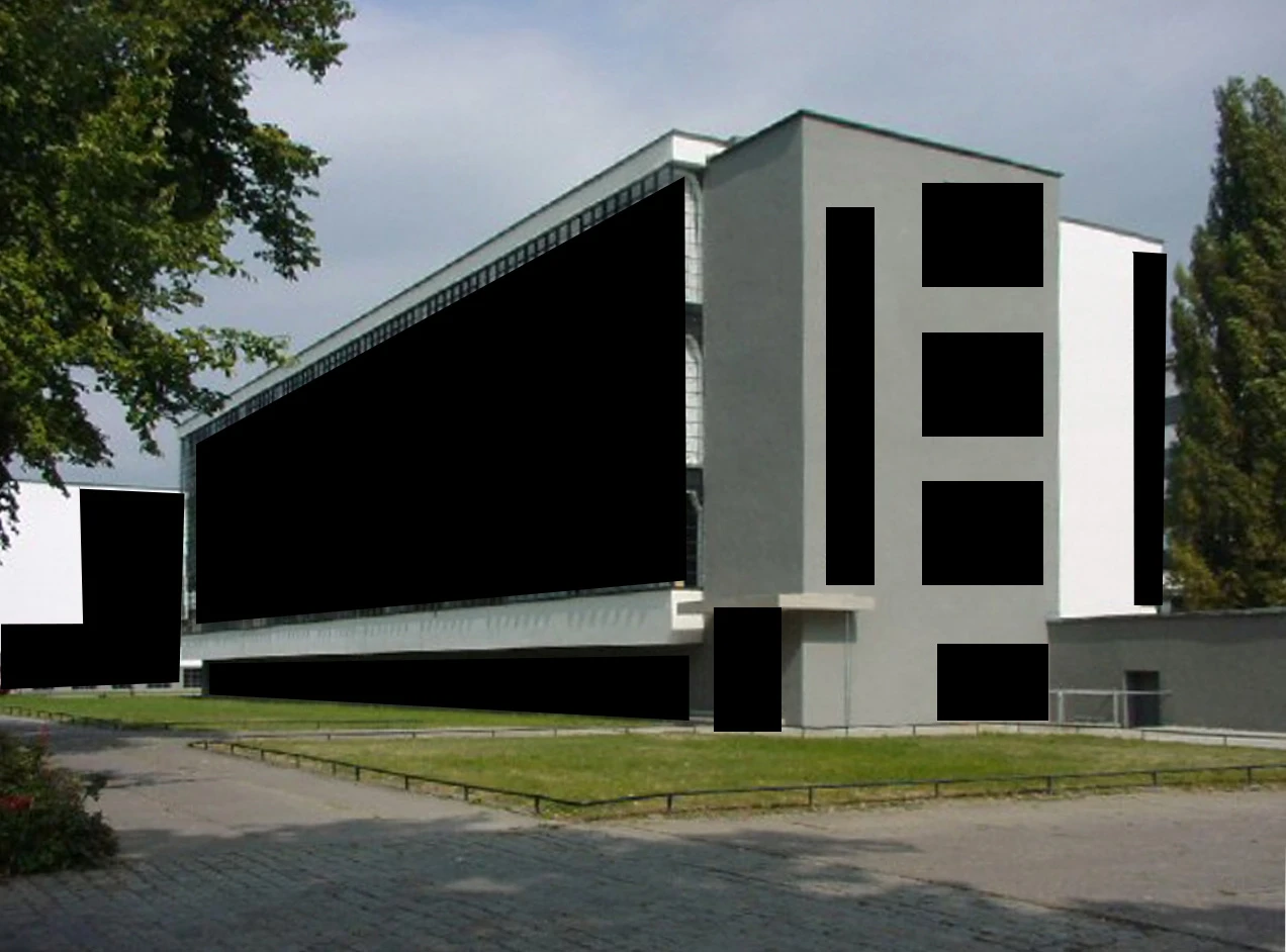 The Bauhaus Dessau main building, with black bars covering every stylistic element of its façade.